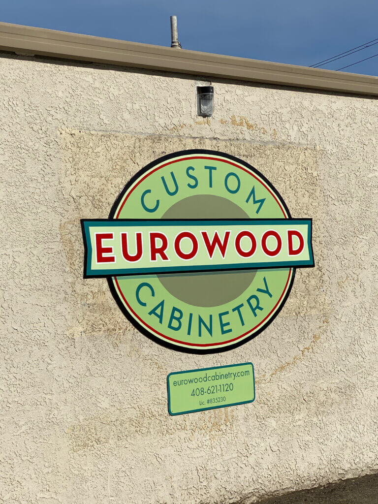 Campbell custom signs eurowood cabinetry wall after