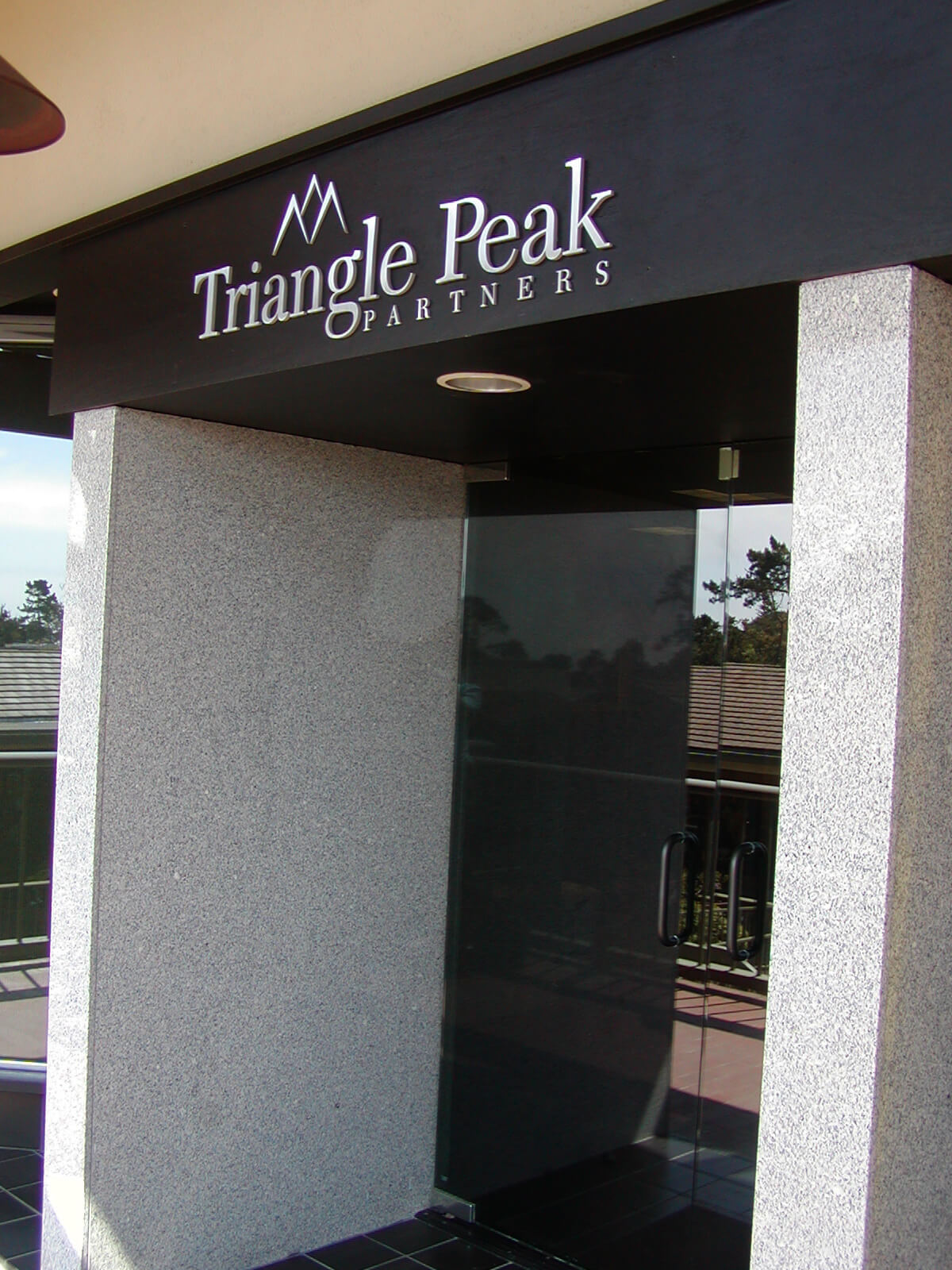 Carmel custom office signs triangle peak partners exterior