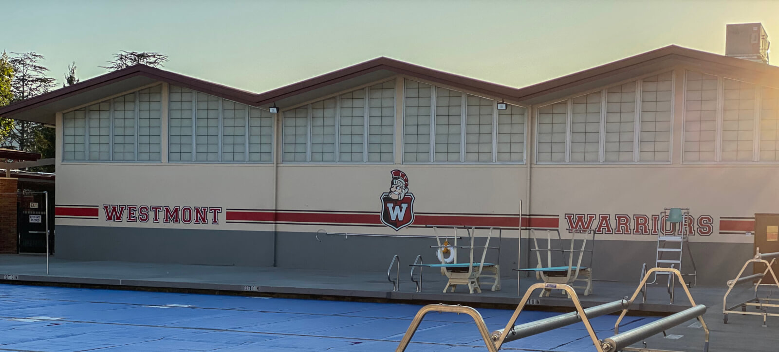 San Jose school signs westmont high pool paint mural mascot