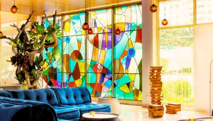 Stained-glass-windows-blue-sofa